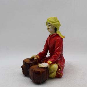 Rajasthani boy,Rajasthani man,Musician man Rajasthani statue, idol Red color