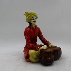 Rajasthani boy,Rajasthani man,Musician man Rajasthani statue, idol Red color